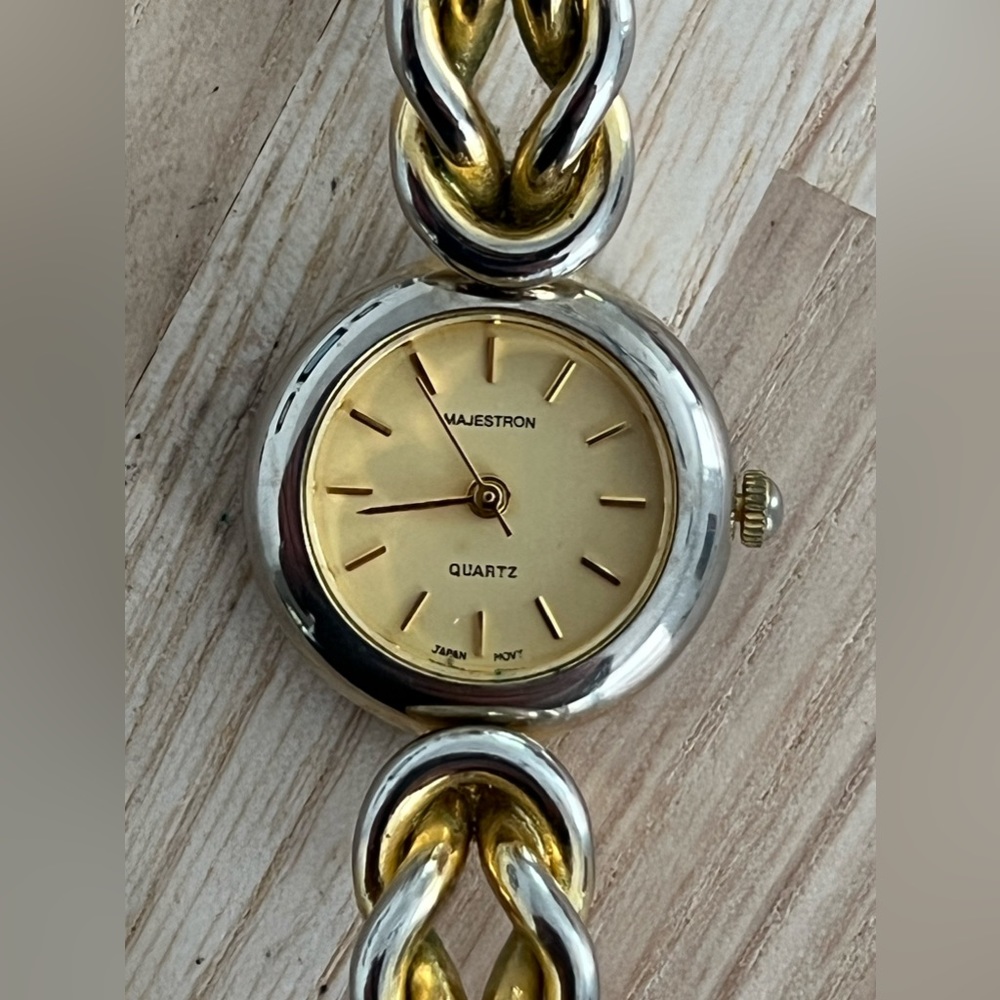 Majestron Ladies Watch Gold Tone Dial Gold Tone Knot Bracelet